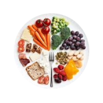 Colorful, healthy food plate with fruits, vegetables, cheese, and bread. A balanced meal for Birth To Five Illinois.